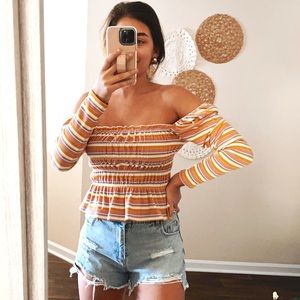 (lane 201 boutique) yellow & pink striped smocked long sleeve peplum hem top